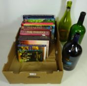 Three 'Magnum'/ large wine bottles and a quantity of books relating to wine Condition