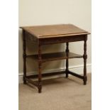 Early 20th century carved oak desk with sloped hinged lid, W69cm, H69cm,