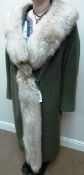 Vintage full length coat with fox fur collar and quilted lining,