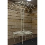 Ivory finish wrought metal circular garden seat with umbrella canopy, D118cm,