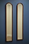 Pair Victorian walnut narrow wall mirrors, moulded arched tops, bevelled glass plates,