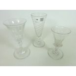 Two late 18th/ early 19th Century cut glass drinking glasses and a similar Wrythen ale glass (3)