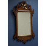 19th century Chippendale style fret work wall mirror with gilt and carved decoration,