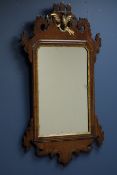 19th century Chippendale style fret work wall mirror with gilt and carved decoration,