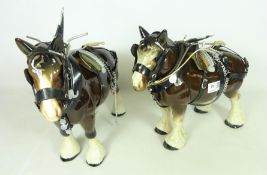 Two large ceramic shire horses with harnesses (2) Condition Report <a