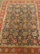 Persian Tabriz rug carpet, green field with interlacing floral design, with red border,