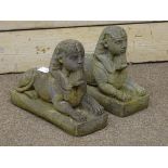 Pair stone effect sphinx figures.