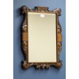 Early 20th century carved '1805' oak framed mirror, bevelled glass plate.