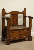 Early 20th century oak hall bench, with hinged seat, umbrella and stick stands, W85cm, H92cm,