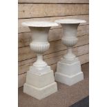 Pair antique white finish Victorian style urns on plinths, egg and dart rim decoration, D57cm,
