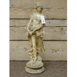 Composite stone figure of a summer girl,