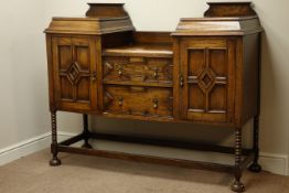 Early 20th century oak twin pedestal sideboard, fitted with two drawers and two cupboards,
