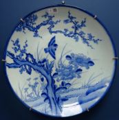 Large Japanese Arita porcelain charger decorated with a swallow and cherry blossom. Dia. 44.