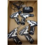 Three Makita TD090D cordless impact drivers, DF330D cordless drill,