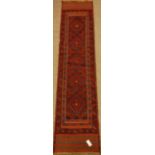 Meshwani red and blue ground runner rug,