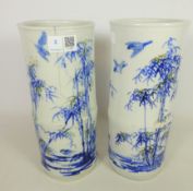 Pair of early 20th Century Japanese cylindrical vases decorated with bamboo and birds H27cm