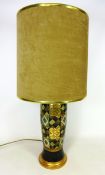 Tall pottery table lamp with gilded decoration,