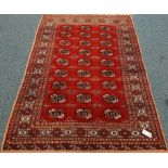 Persian Bokhara red ground rug, 177cm x 127cm Condition Report <a href='//www.