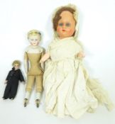 Three 19th/ early 20th Century dolls;