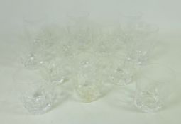 Set of seven Stuart crystal barrel shaped tumblers and set of six smaller barrel shaped glasses -