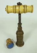 19th Century bronze bone handle cork screw and a vintage Moet cork (2) Condition Report