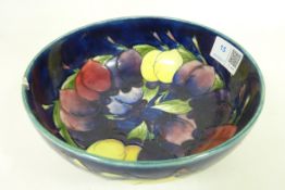 Moorcroft Plum Wisteria bowl signed in blue and impressed marks on base. Dia 18.
