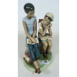 Lladro figure of two boys. H.