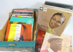 Collection of Jazz records and a large collection of Nat King Cole and other records in two boxes
