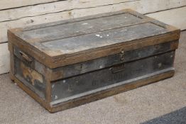 Early 20th century wooden and metal bound travelling trunk, with metal lining,