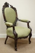 Victorian walnut open arm armchair, carved with shell pediment and scrolled arm,