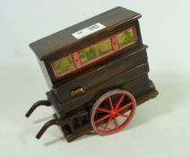 Novelty cigarette dispenser in the form of a musical Barrel organ, by Tallert,