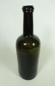 Late 18th/ early 19th Century English cylindrical shaped dark olive green wine bottle with string