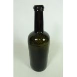 Late 18th/ early 19th Century English cylindrical shaped dark olive green wine bottle with string