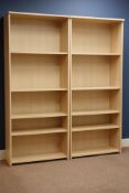 Two light wood open bookcases, W74cm, H178cm,