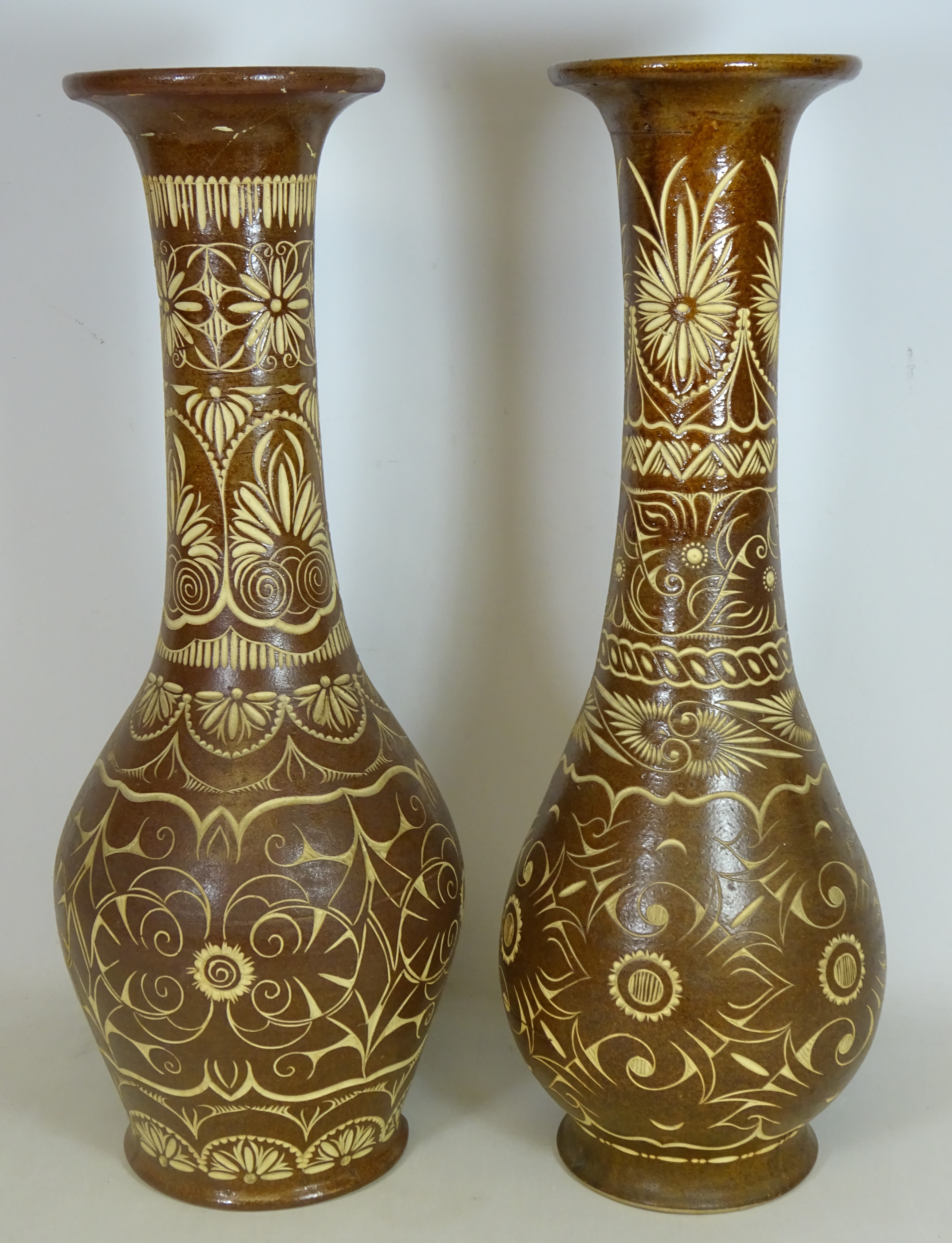 Two stoneware vases in the style of William De Morgan,