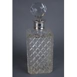 Cut glass decanter with hallmarked silver collar by C. J.