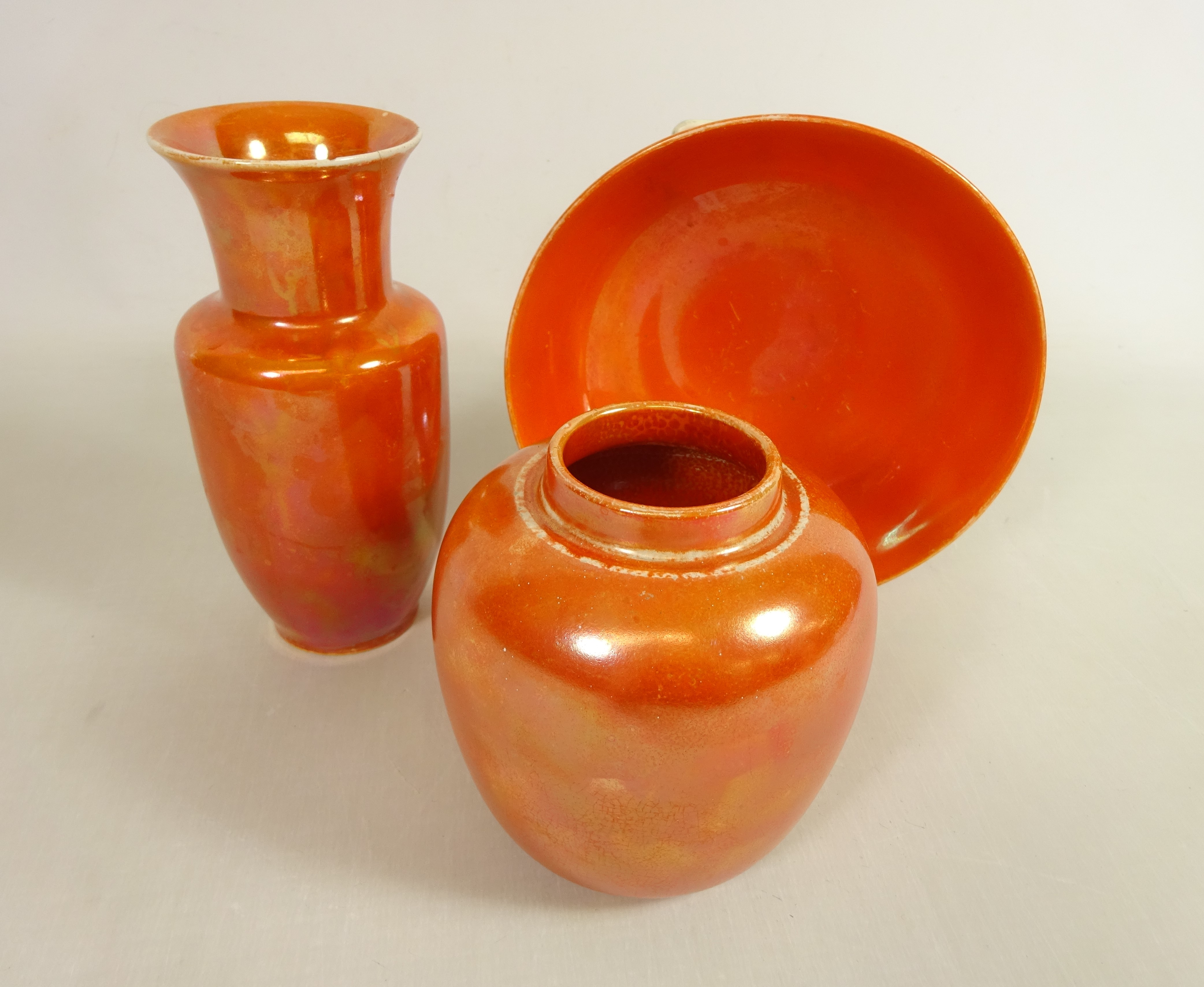 Ruskin orange lustre vase with flared neck, impressed 'Ruskin 1922' H15cm,