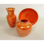 Ruskin orange lustre vase with flared neck, impressed 'Ruskin 1922' H15cm,