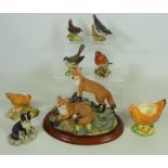 Four Beswick birds,