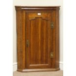 19th century oak wall hanging corner cupboard enclosed by single panelled door, W67cm,