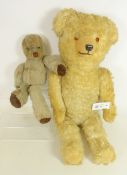 Early 20th Century straw filled Teddy Bear with glass eyes and a later gold plush Teddy Bear,