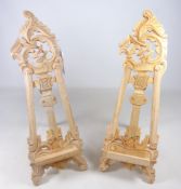Two small carved teak easels,