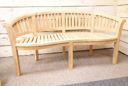 Solid teak dowel jointed serpentine garden bench,