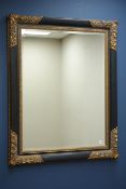 Large ebonised and gilt framed mirror, bevelled glass plate,