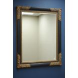 Large ebonised and gilt framed mirror, bevelled glass plate,