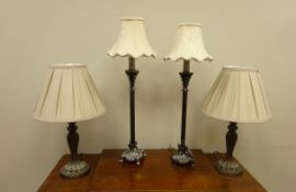 Two pairs of traditional style table lamps,
