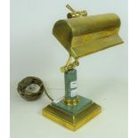 Polished stone and brass desk lamp,