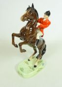 Beswick huntsman on rearing bay horse, by Arthur Gredington,