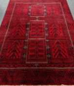 Persian Baluchi red ground rug, 245cm x 182cm Condition Report <a href='//www.