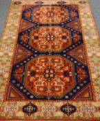 Persian blue ground rug with triple medallion field, geometric design,